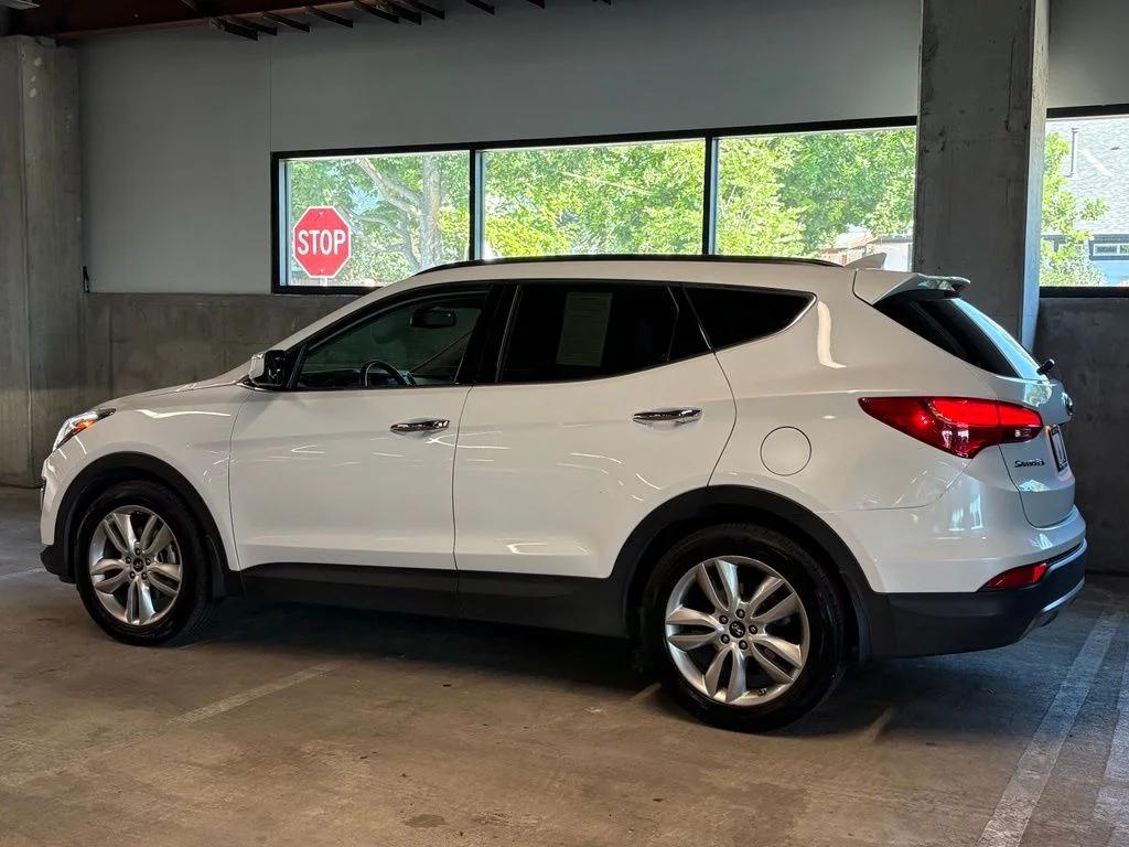 hyundai santa fe 2016 5XYZWDLA6GG306013 image hyundai santa fe 2016 5XYZWDLA6GG306013 image